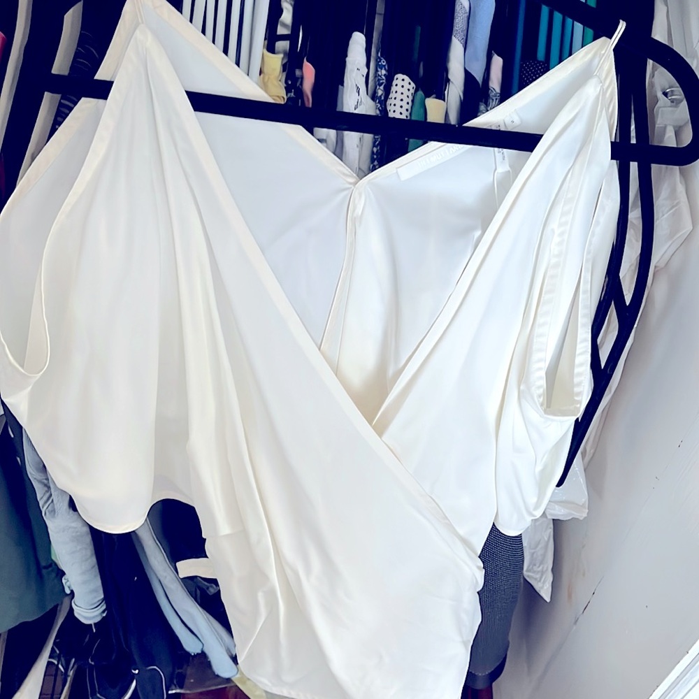 White top with crossing strap